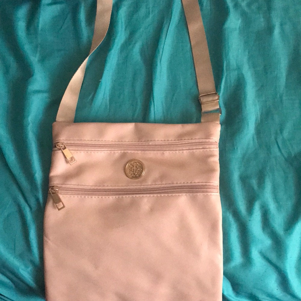 A pink purse I never wear it anymore.